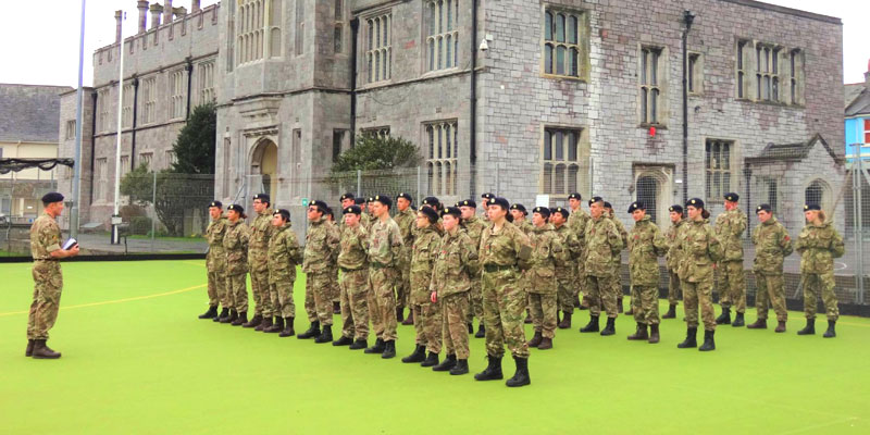 Photo of the Plymouth College Combined Cadet Force (CCF) outside on the astro turf